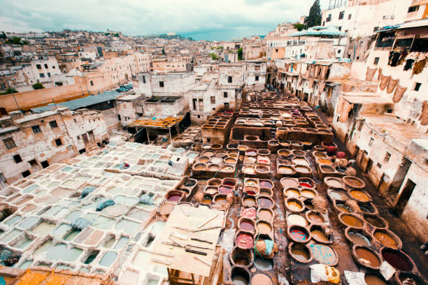 Tannery,Fez cityscape from above with traditional leather tanning and dyeing tannery in the old medina of Fez - Fes, Morocco, Africa.